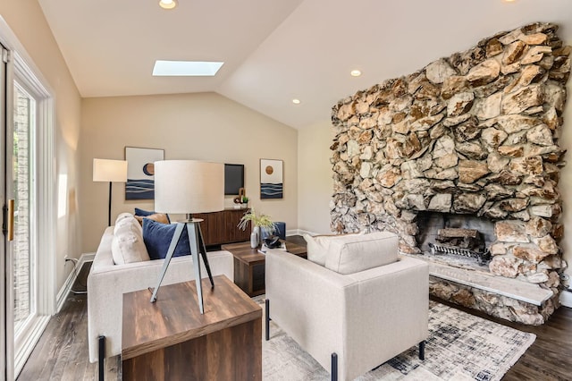 406 Lauder Ln, Inverness, IL 60067 - living room with wood finished floors, lofted ceiling, a skylight, a fireplace, and baseboards