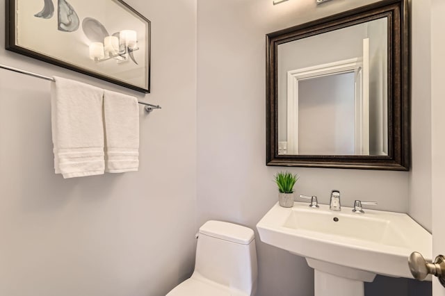 406 Lauder Ln, Inverness, IL 60067 - half bathroom with toilet and a sink