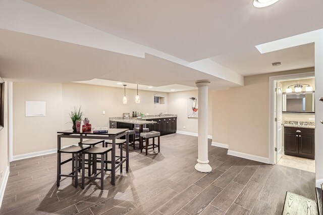 406 Lauder Ln, Inverness, IL 60067 - dining space with wood finished floors, baseboards, wet bar, and recessed lighting