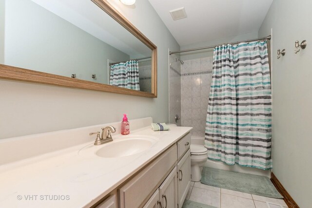13103 W Beaver Lake Dr, Homer Glen, IL 60491 - bathroom with vanity, tile patterned flooring, and shower / tub combo