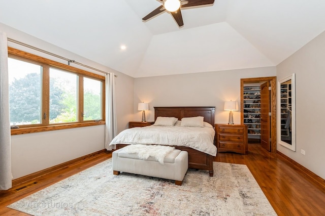 13103 W Beaver Lake Dr, Homer Glen, IL 60491 - bedroom featuring wood finished floors, lofted ceiling, a ceiling fan, a spacious closet, and recessed lighting