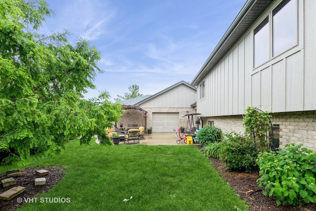 13103 W Beaver Lake Dr, Homer Glen, IL 60491 - view of grassy yard featuring an outdoor hangout area, a patio, and a garage