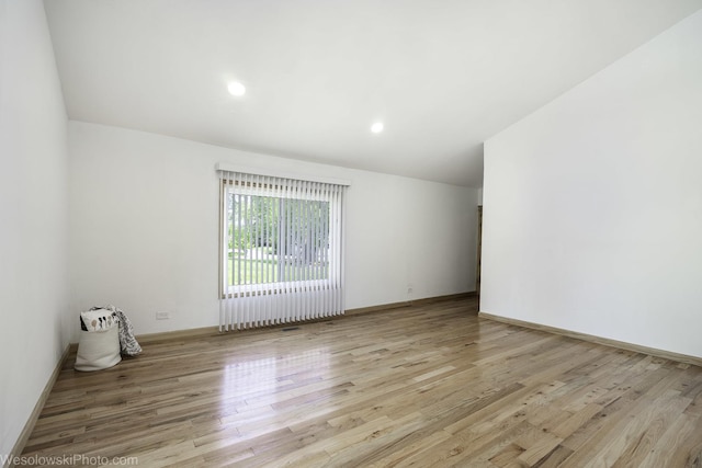 23314 W Liberty Ave, Lake Villa, IL 60046 - empty room with light wood-type flooring, baseboards, and recessed lighting