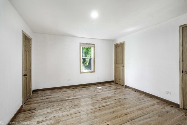 23314 W Liberty Ave, Lake Villa, IL 60046 - spare room featuring light wood-style flooring and baseboards