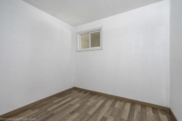 23314 W Liberty Ave, Lake Villa, IL 60046 - empty room with dark wood finished floors and baseboards