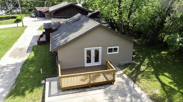 23314 W Liberty Ave, Lake Villa, IL 60046 - back of house featuring french doors, a shingled roof, and a lawn