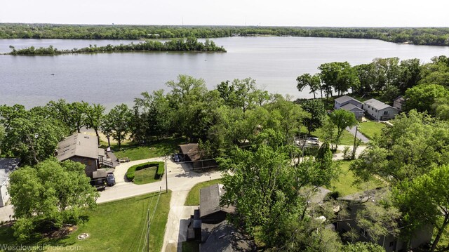 23314 W Liberty Ave, Lake Villa, IL 60046 - view of front facade with a front yard, a deck, an outbuilding, and a garage