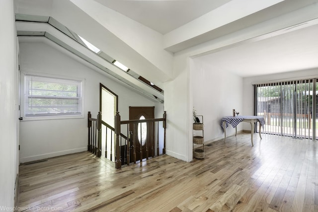 23314 W Liberty Ave, Lake Villa, IL 60046 - spare room with light wood-style floors, vaulted ceiling, and baseboards