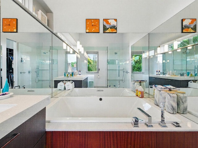 7415 W Main St, Niles, IL 60714 - full bathroom featuring a bath, a stall shower, and two vanities