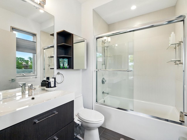 7415 W Main St, Niles, IL 60714 - full bathroom featuring vanity, toilet, and combined bath / shower with glass door