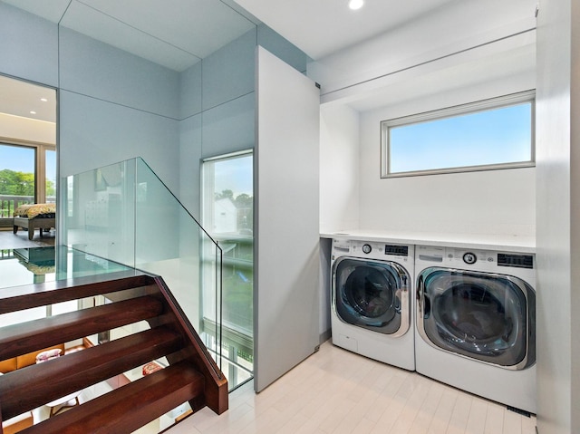 7415 W Main St, Niles, IL 60714 - laundry area with plenty of natural light, washer and clothes dryer, and recessed lighting