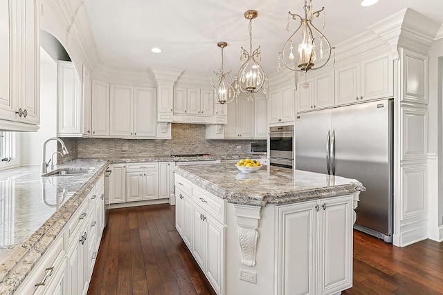 14151 131st St, Lemont, IL 60439 - kitchen featuring appliances with stainless steel finishes, a sink, dark wood-type flooring, a chandelier, and recessed lighting