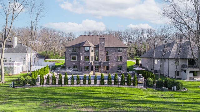14151 131st St, Lemont, IL 60439 - back of property featuring a chimney and a balcony