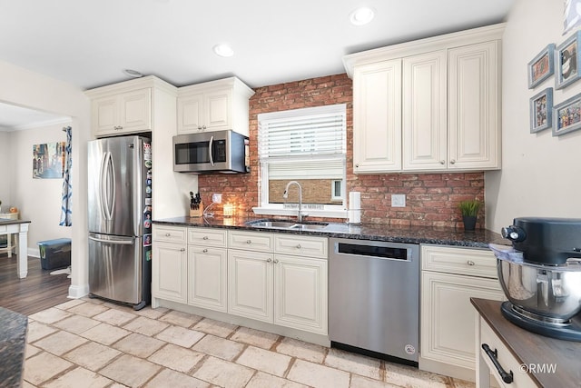 735 S Spring Rd, Elmhurst, IL 60126 - kitchen with appliances with stainless steel finishes, a sink, decorative backsplash, dark stone countertops, and recessed lighting
