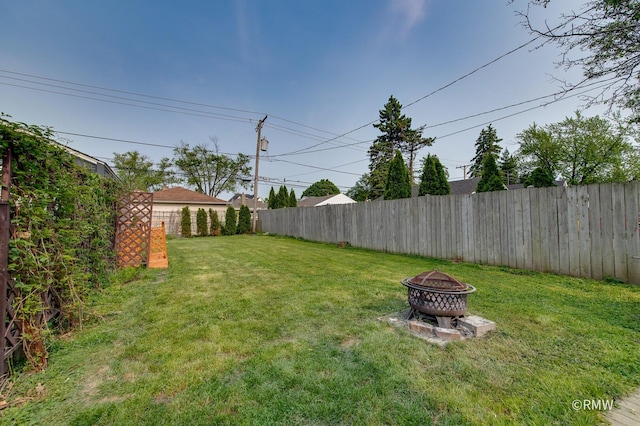 735 S Spring Rd, Elmhurst, IL 60126 - view of yard featuring an outdoor fire pit