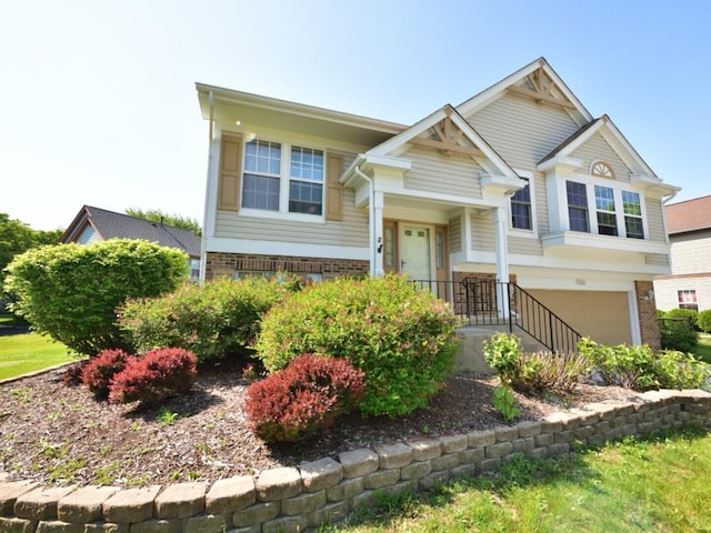 1740 Somerfield Ln, Crystal Lake, IL 60014 - view of front facade featuring brick siding and a garage