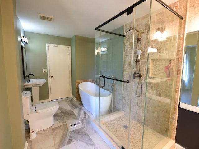1740 Somerfield Ln, Crystal Lake, IL 60014 - full bath with a freestanding tub, a stall shower, toilet, and marble finish floors
