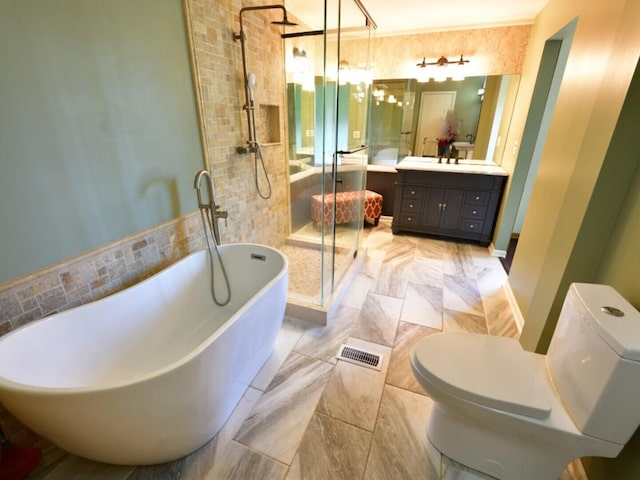 1740 Somerfield Ln, Crystal Lake, IL 60014 - bathroom featuring toilet, vanity, a freestanding tub, and a shower stall