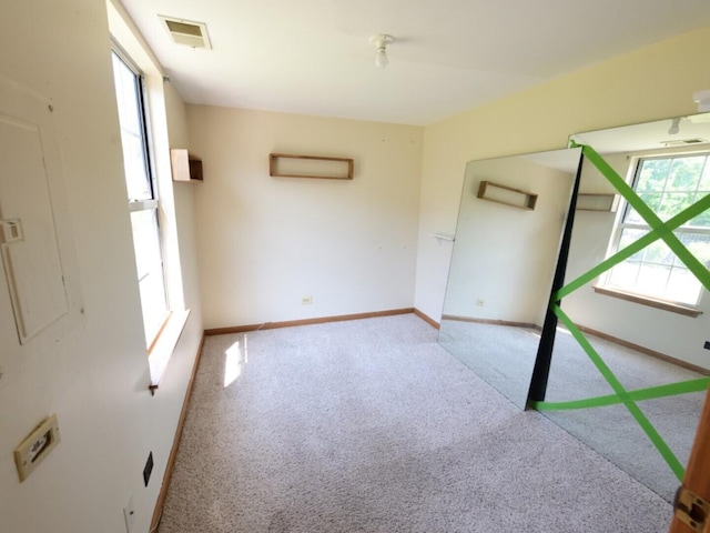 1740 Somerfield Ln, Crystal Lake, IL 60014 - unfurnished room featuring carpet floors, plenty of natural light, and baseboards