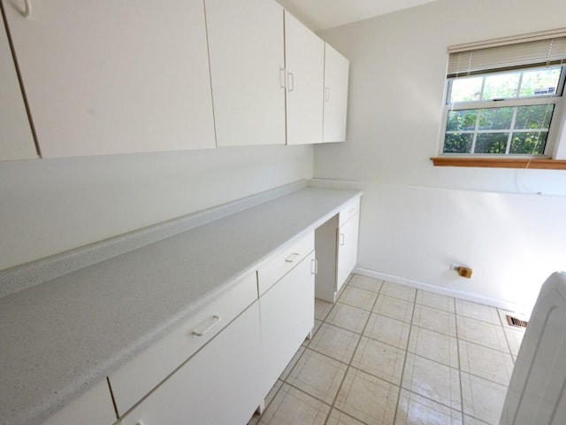 1740 Somerfield Ln, Crystal Lake, IL 60014 - laundry room with baseboards