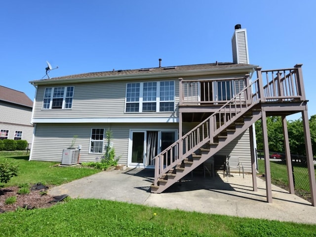 1740 Somerfield Ln, Crystal Lake, IL 60014 - rear view of property featuring a patio area, stairs, a wooden deck, a yard, and a chimney