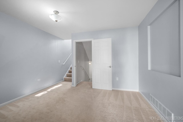 3023 Saganashkee Ln, Naperville, IL 60564 - carpeted spare room with stairs and baseboards
