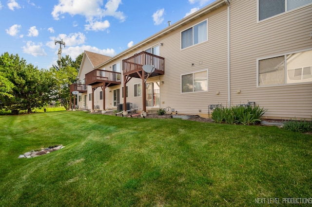 3023 Saganashkee Ln, Naperville, IL 60564 - back of house with a yard, a wooden deck, and central AC unit
