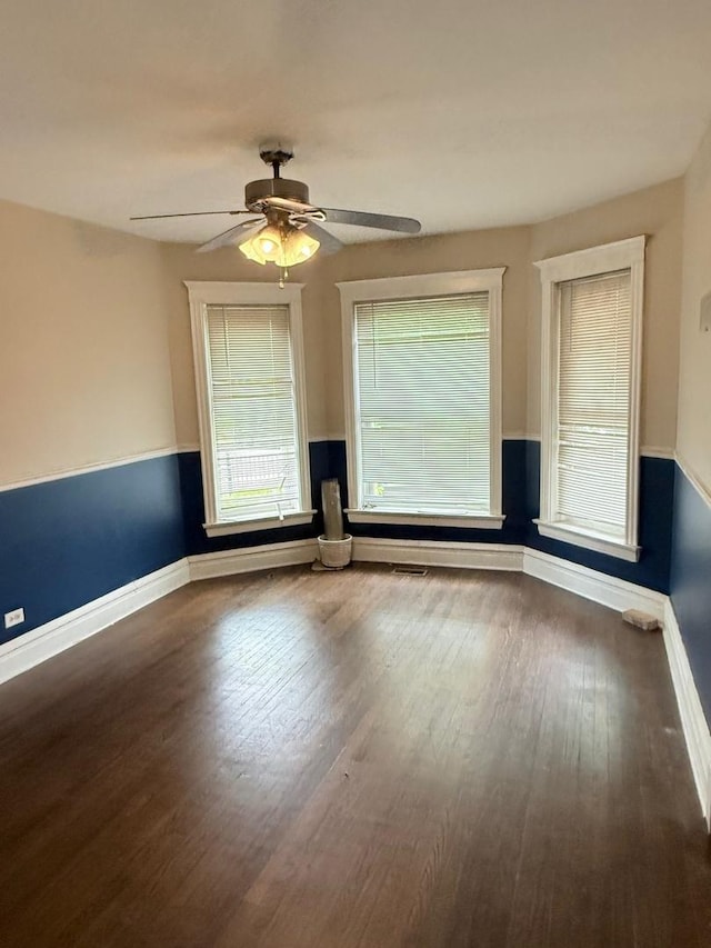 7621 S Normal Ave, Chicago, IL 60620 - unfurnished room with baseboards, wood finished floors, and ceiling fan