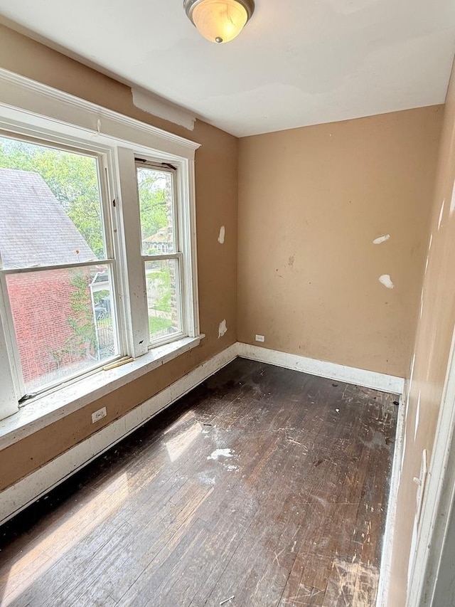 7621 S Normal Ave, Chicago, IL 60620 - unfurnished room with hardwood / wood-style floors and baseboards