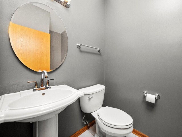 3445 W 114th St, Chicago, IL 60655 - half bath with toilet, baseboards, and a sink