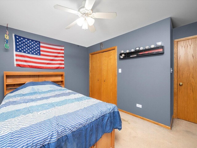 3445 W 114th St, Chicago, IL 60655 - carpeted bedroom with baseboards, a ceiling fan, and a closet