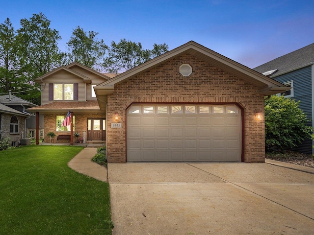 3445 W 114th St, Chicago, IL 60655 - view of front of house featuring brick siding, driveway, a lawn, and an attached garage
