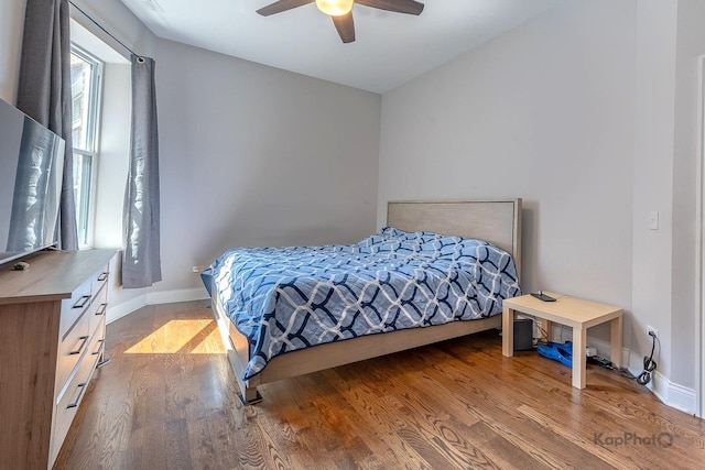 4520 S King Dr Unit 4B, Chicago, IL 60653 - bedroom with wood finished floors, baseboards, and a ceiling fan