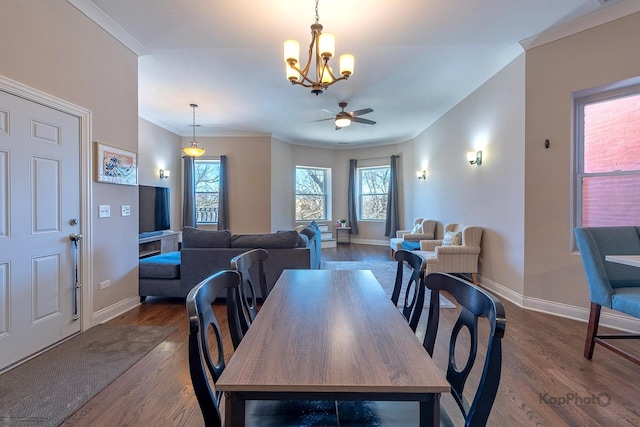 4520 S King Dr Unit 4B, Chicago, IL 60653 - dining area featuring a chandelier, a ceiling fan, wood finished floors, baseboards, and ornamental molding