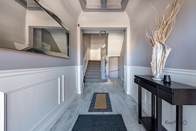 4520 S King Dr Unit 4B, Chicago, IL 60653 - hallway featuring a decorative wall, a wainscoted wall, and stairway