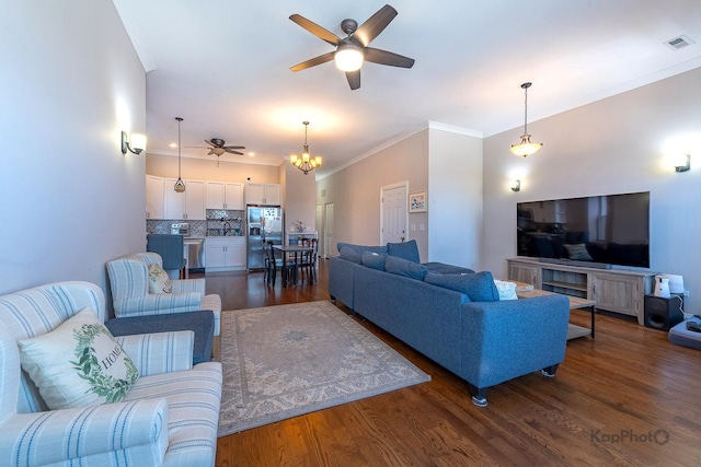 4520 S King Dr Unit 4B, Chicago, IL 60653 - living area with ceiling fan, dark wood-style floors, ornamental molding, and a chandelier