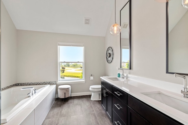 12433 Dublin Ln, Plainfield, IL 60585 - full bathroom with a garden tub, double vanity, vaulted ceiling, toilet, and baseboards