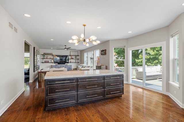 12433 Dublin Ln, Plainfield, IL 60585 - kitchen with plenty of natural light, a chandelier, dark wood-style floors, light countertops, and recessed lighting