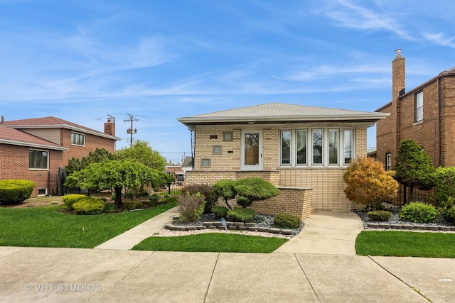 5341 S Austin Ave, Chicago, IL 60638 - view of front facade featuring brick siding and a front yard