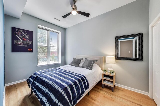 834 N Wood St Unit 2N, Chicago, IL 60622 - bedroom with baseboards, wood finished floors, and ceiling fan