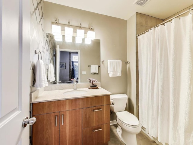 834 N Wood St Unit 2N, Chicago, IL 60622 - bathroom featuring toilet, vanity, tile patterned flooring, and curtained shower