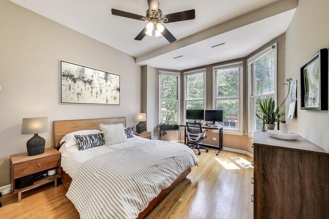 834 N Wood St Unit 2N, Chicago, IL 60622 - bedroom featuring multiple windows, light wood-type flooring, and baseboards