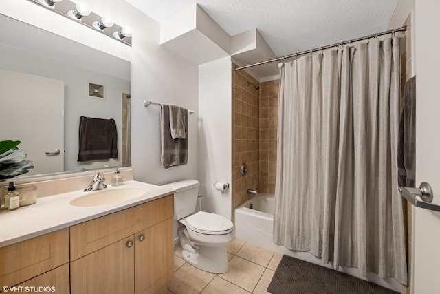 800 Elgin Rd Unit 806, Evanston, IL 60201 - full bath with tile patterned flooring, vanity, shower / bath combo with shower curtain, and a textured ceiling