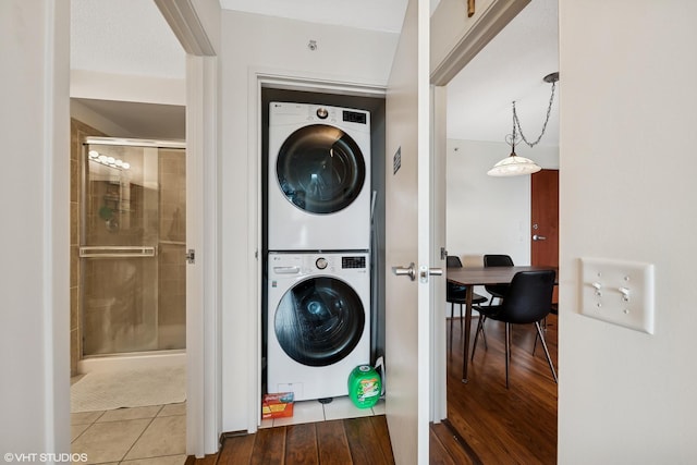 800 Elgin Rd Unit 806, Evanston, IL 60201 - laundry room with stacked washer / dryer and wood finished floors