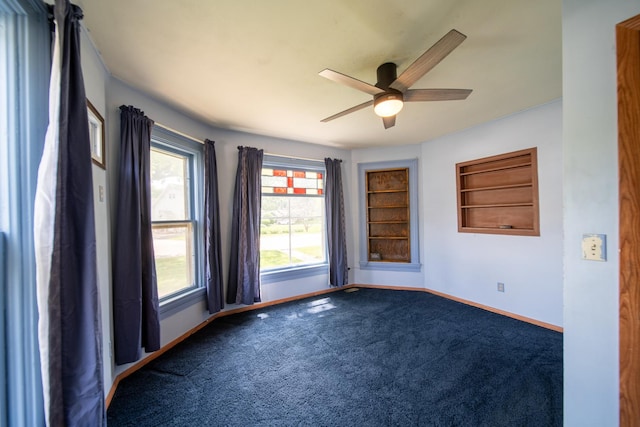 521 Armeida St, Dixon, IL 61021 - carpeted spare room with baseboards and ceiling fan
