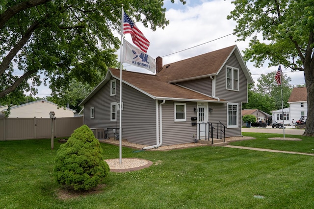 521 Armeida St, Dixon, IL 61021 - rear view of house with roof with shingles and a chimney