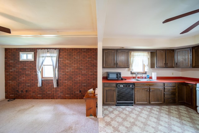 521 Armeida St, Dixon, IL 61021 - kitchen featuring brick wall, dishwasher, stainless steel microwave, dark brown cabinets, and light flooring