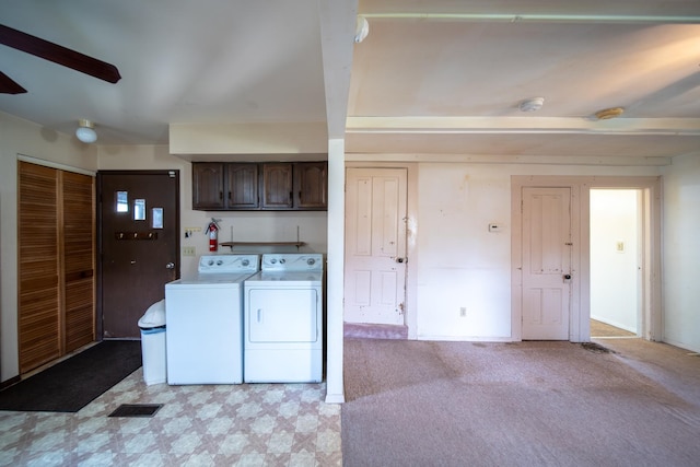 521 Armeida St, Dixon, IL 61021 - laundry room featuring washer and clothes dryer, cabinet space, and light flooring