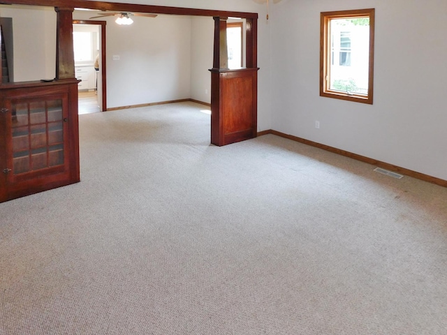 829 Blackhawk Blvd, South Beloit, IL 61080 - spare room with healthy amount of natural light, ceiling fan, light colored carpet, and baseboards