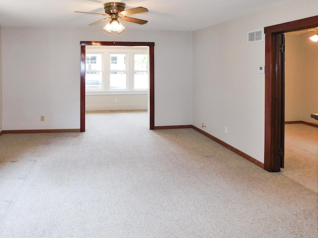 829 Blackhawk Blvd, South Beloit, IL 61080 - spare room with a ceiling fan, carpet, and baseboards